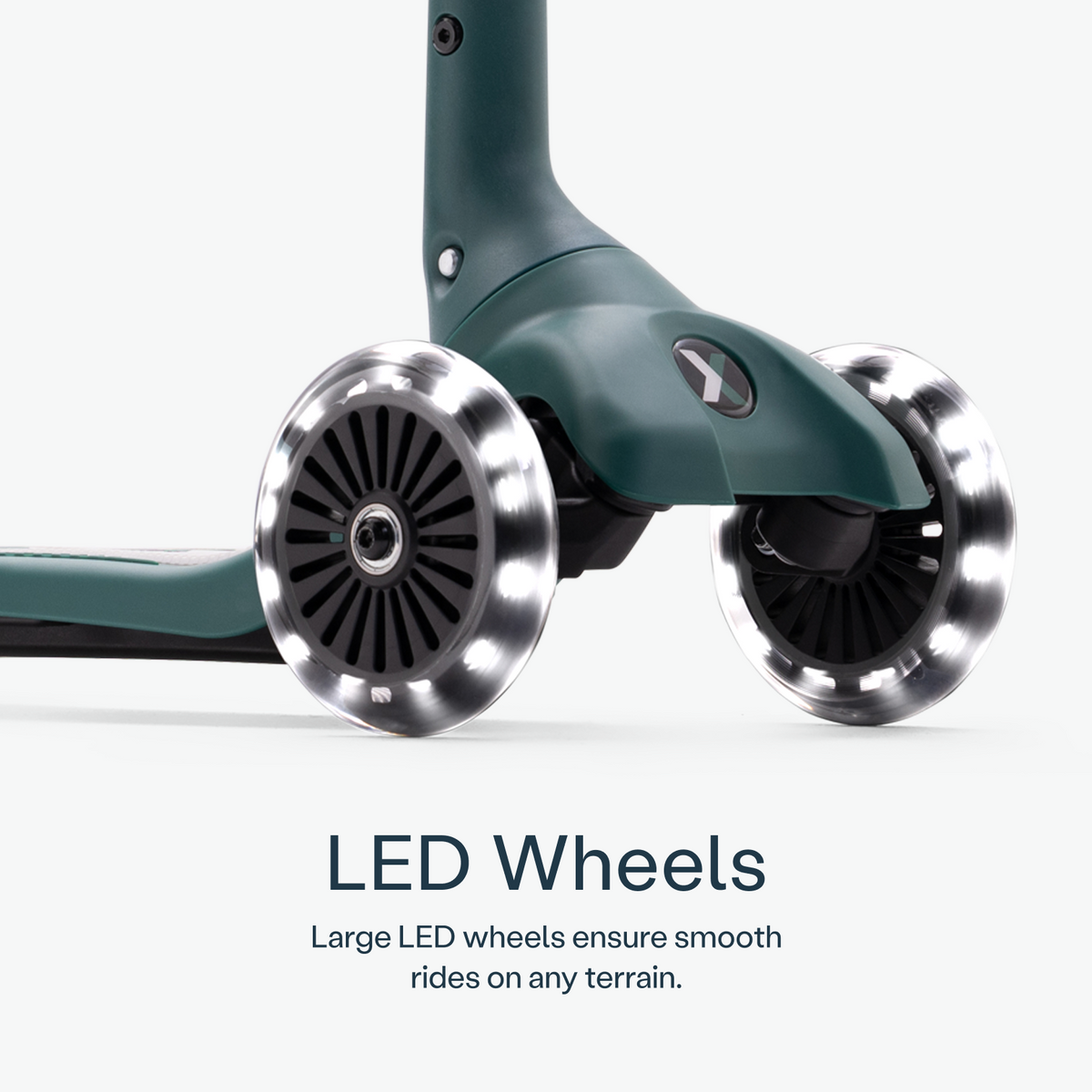 smarTrike Xtend Mini+ scooter in green with front wheel and handlebar, designed for young children, outdoor riding toy