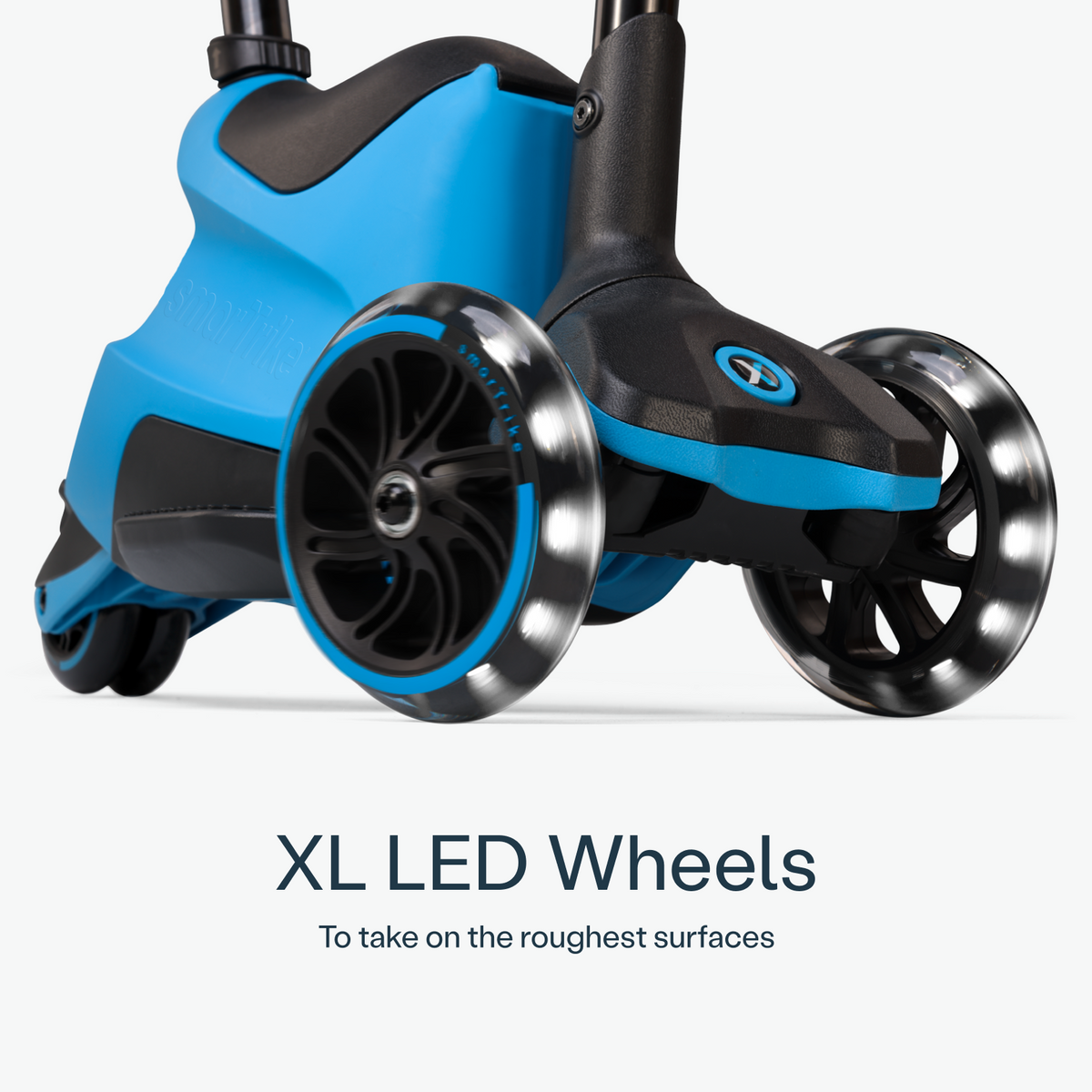 Blue smarTrike Xtend Ride-on scooter with wheels, suitable for young children, featuring a sturdy design and comfortable seat.