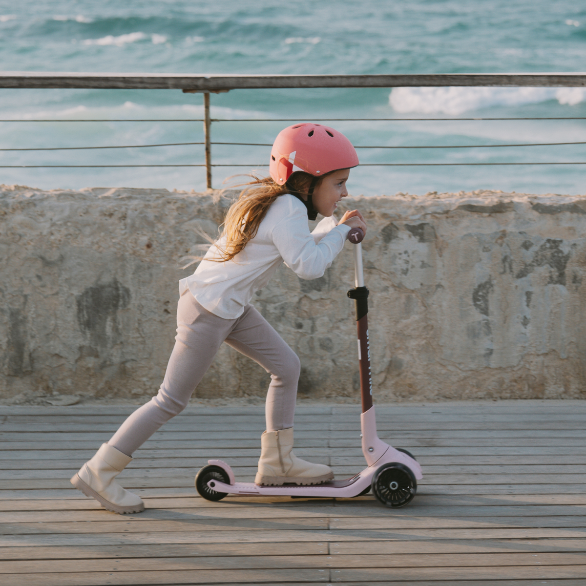 smarTrike Xtend Mini+ scooter with adjustable handlebar and compact design, suitable for young children and outdoor play