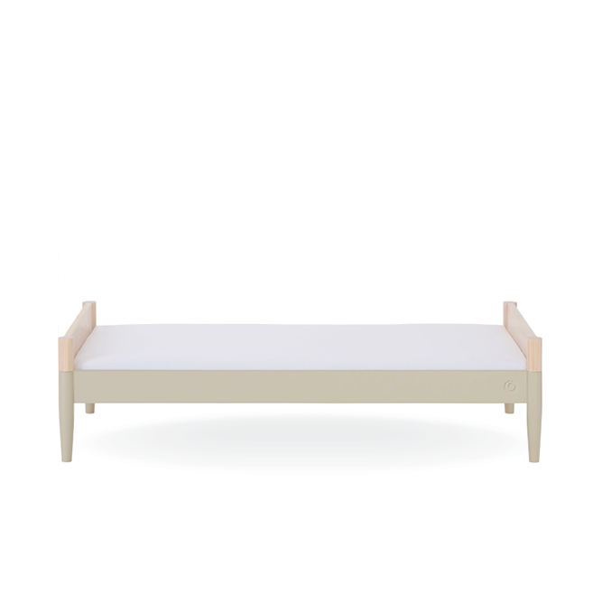 Gaia Baby Eos Cot Bed in natural ash with desert sage finish, showcasing the wooden frame and slatted design.