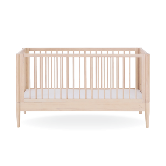 Gaia Baby Eos Cot Bed in natural ash finish, showcasing the sturdy wooden frame and smooth design for a baby's nursery.
