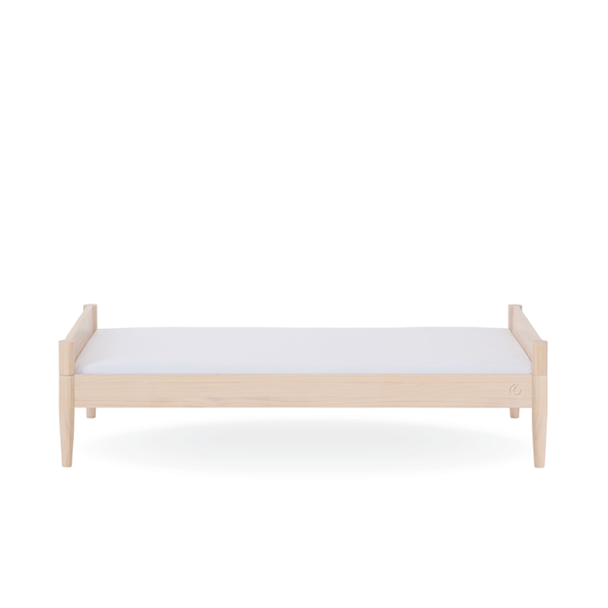 Gaia Baby Eos Cot Bed in natural ash wood with slatted sides and sturdy frame, designed for nursery sleeping comfort