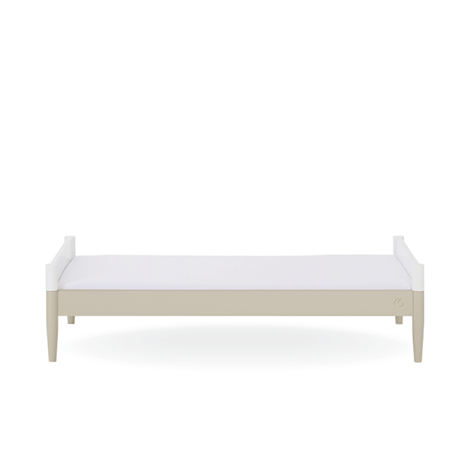 White Gaia Baby Eos Cot Bed with a sturdy frame and slatted sides, designed for safe and comfortable infant sleep.