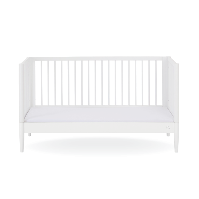 White Gaia Baby Eos Cot Bed with slatted sides and sturdy frame, designed for baby’s nursery and easy to convert.