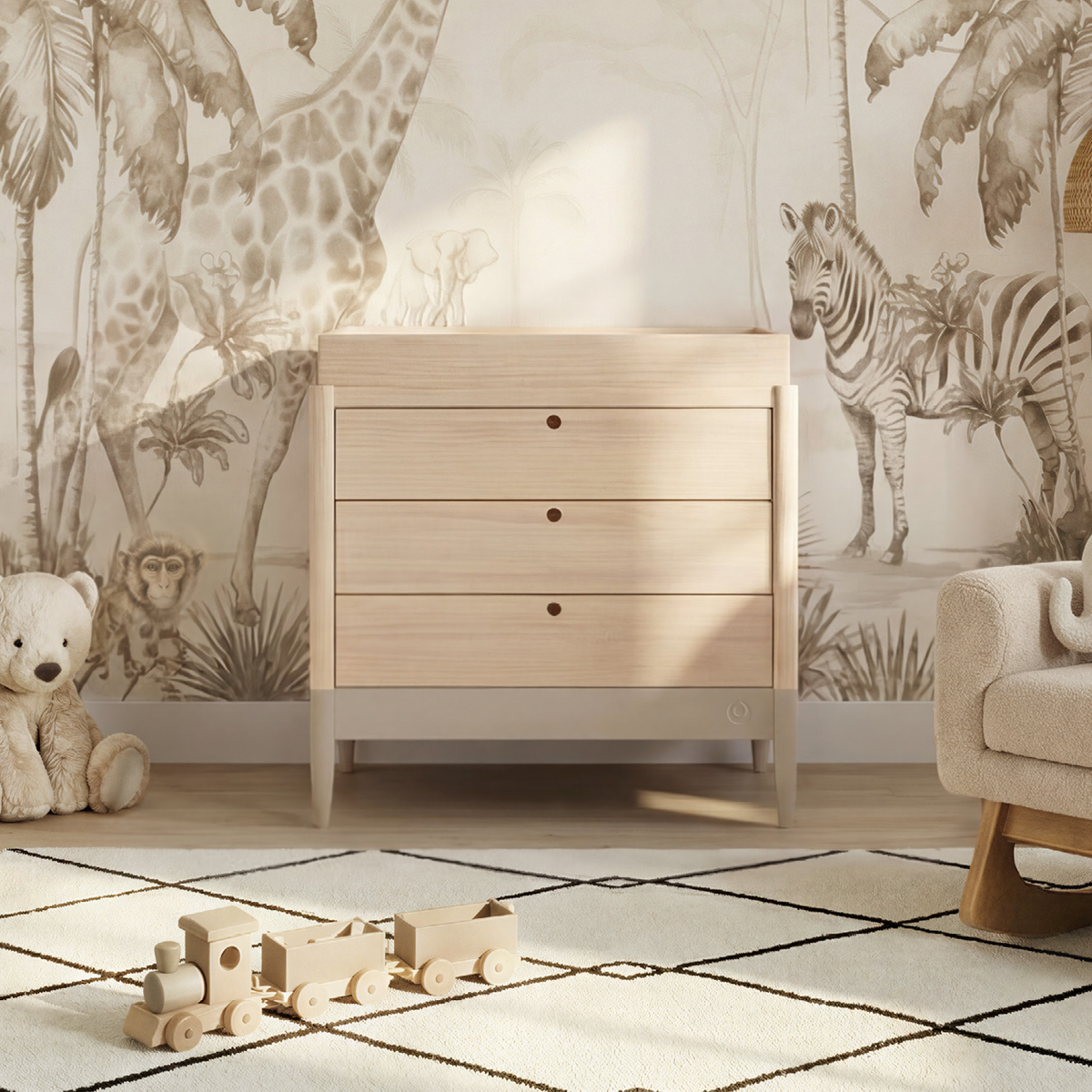 Natural Gaia Baby Eos dresser in cashmere finish with sleek wood drawers and modern design, shown in a stylish bedroom setting.
