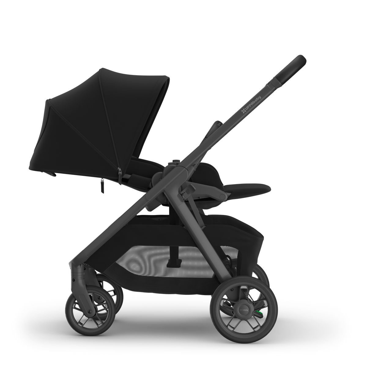 UPPAbaby Kona pram in James (black), side view with the seat reversed and reclined with the sunshade extended