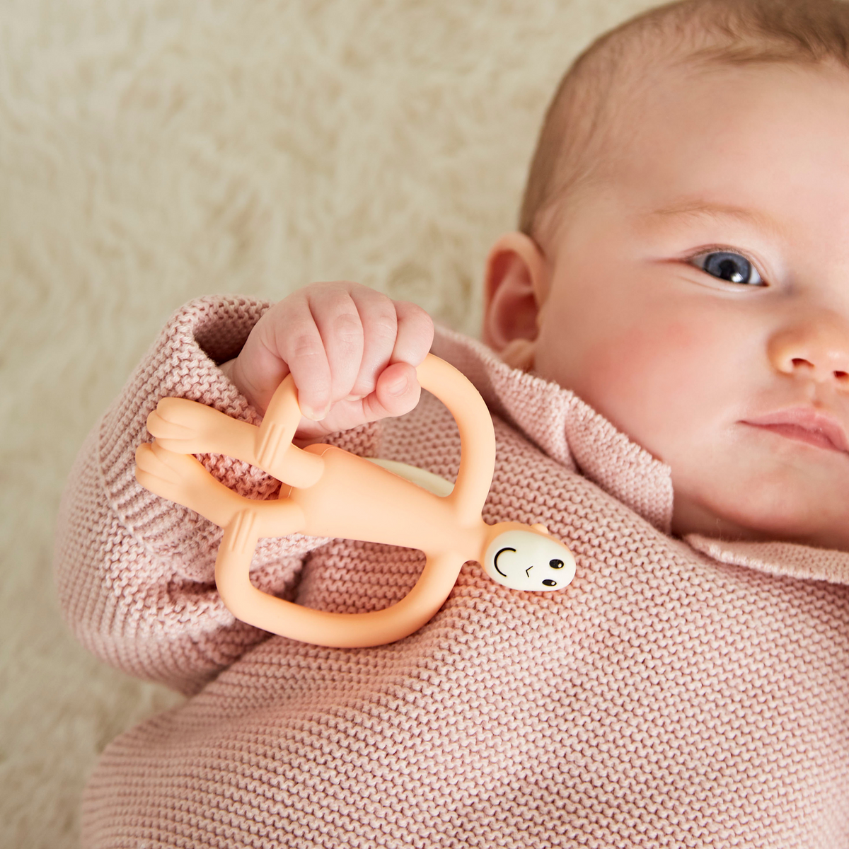Matchstick Monkey Teething Toy and Gel Applicator - Peach baby teether for sore gums with textured bumps and easy-grip design