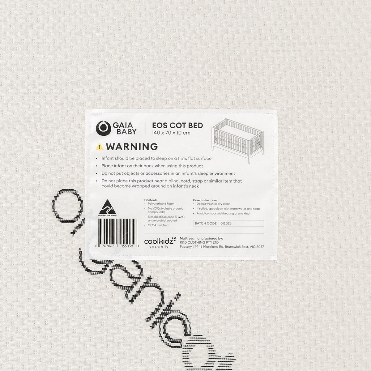 Gaia Baby Eos Cot Mattress in 140x70x10, showing a soft, supportive mattress with a fitted sheet on a cot bed.