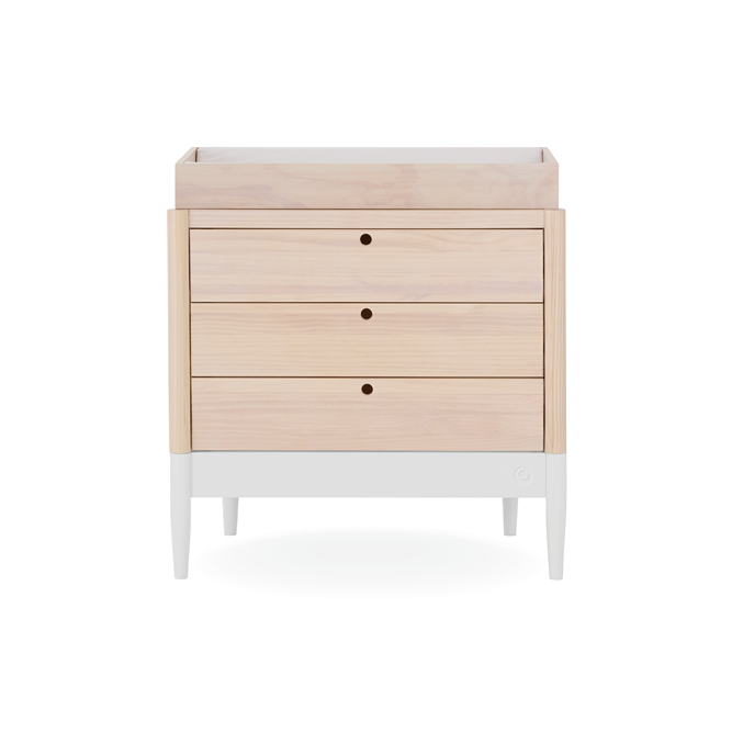 Gaia Baby Eos dresser in natural wood finish with white drawers, featuring sleek handles and spacious storage for nursery organization.