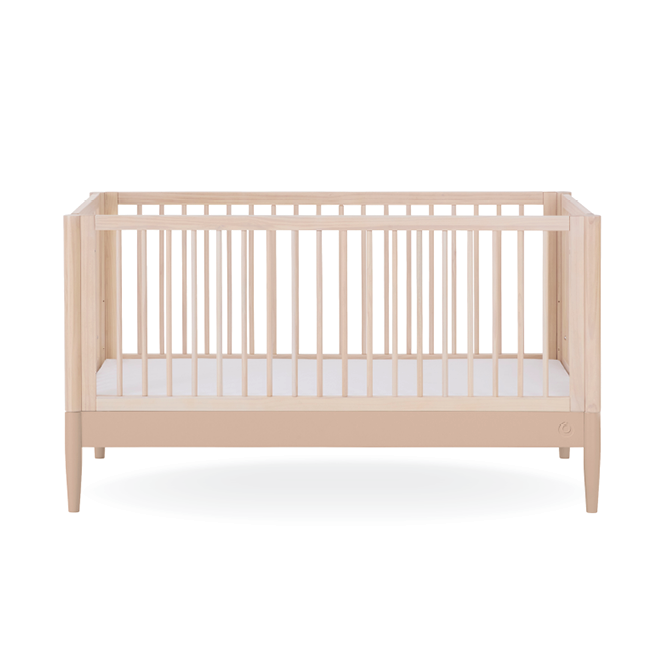 Gaia Baby Eos Cot Bed in natural ash with powder blush finish, showcasing a modern wooden baby cot with clean lines and smooth edges.