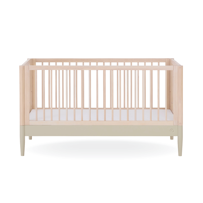 Eos Cot Bed in natural ash finish by Gaia Baby, showing a sturdy wooden baby cot with slatted sides and a natural wood frame.