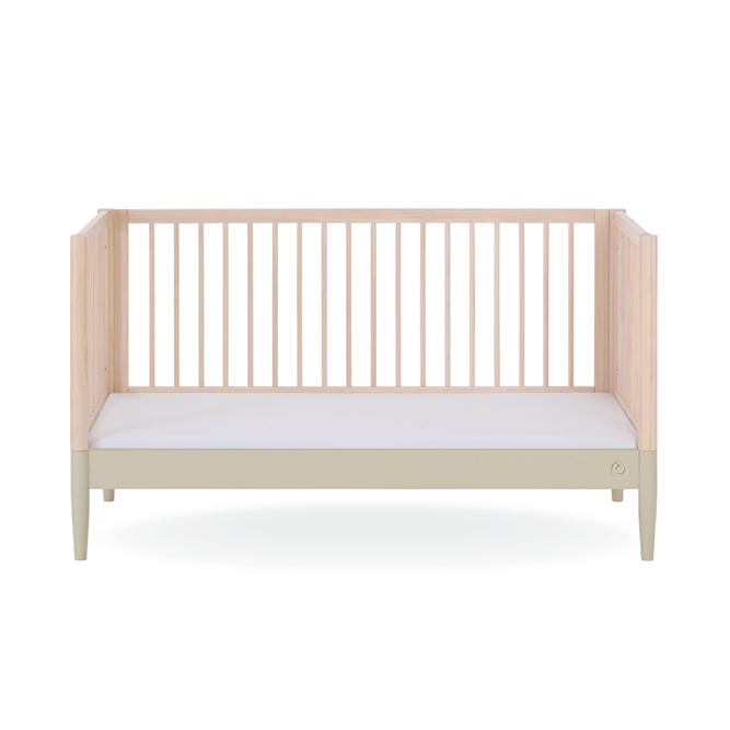 Gaia Baby Eos Cot Bed in natural ash finish with desert sage accents, showcasing its sturdy wooden frame and modern design.