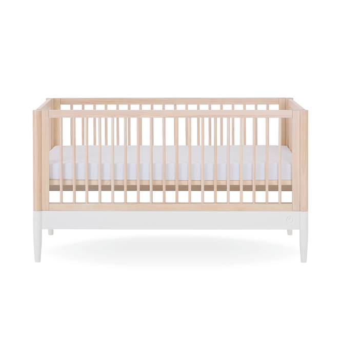 Eos Cot Bed in natural ash with white finish by Gaia Baby, showcasing the sturdy wooden frame and smooth design.