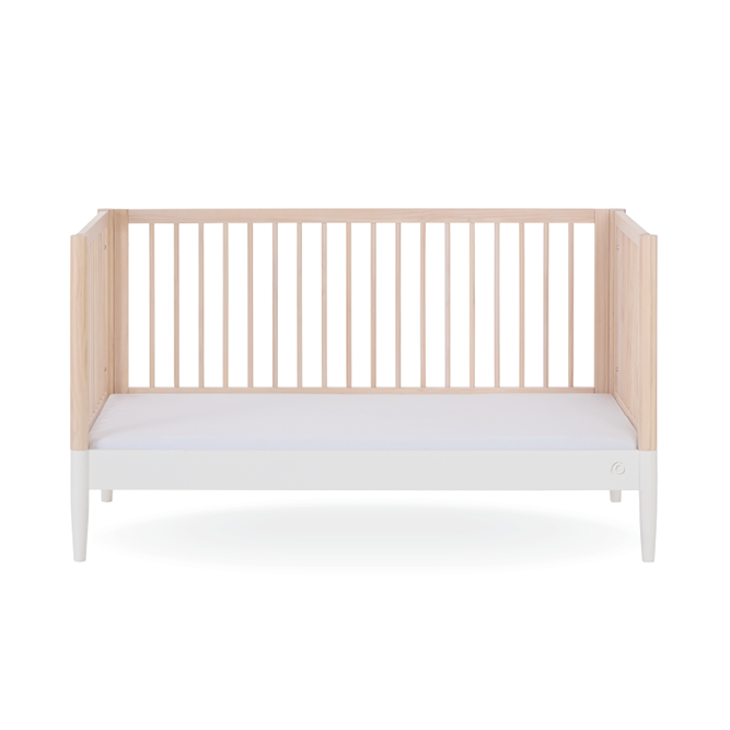 Eos Cot Bed by Gaia Baby in natural ash finish, featuring a sturdy wooden frame and white accents for a modern nursery look.