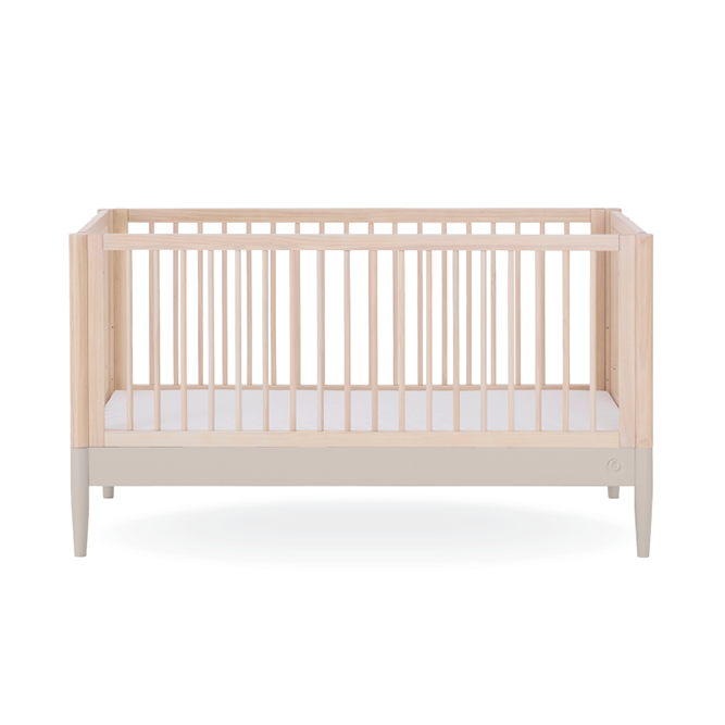 Eos Cot Bed by Gaia Baby in natural ash finish with soft cashmere bedding, showcasing the sturdy wooden frame and elegant design.