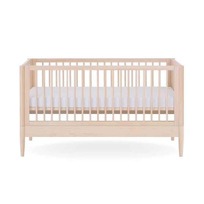 Gaia Baby Eos Cot Bed in Natural Ash with a sturdy frame, showcasing a sleek, modern design suitable for a nursery setting.
