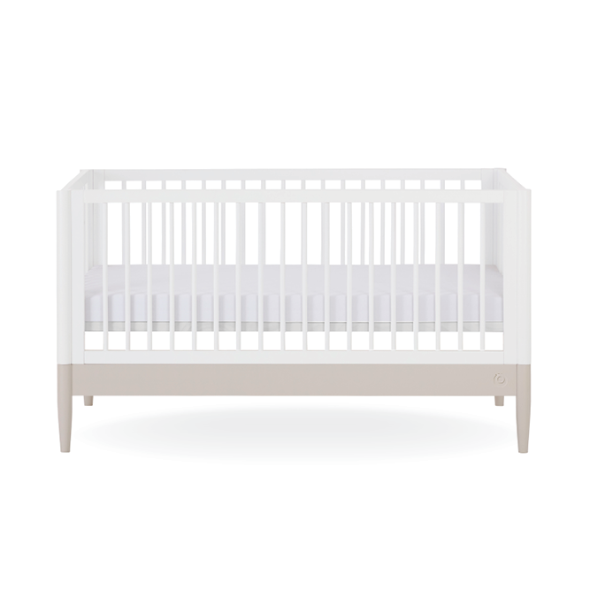 White Gaia Baby Eos cot bed with soft cashmere finish, featuring a sturdy frame and gentle design suitable for a nursery.