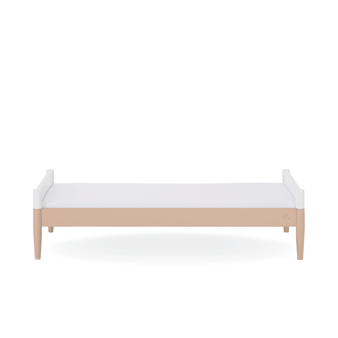 White Gaia Baby Eos cot bed with powder blush accents, showing the sturdy wooden frame and classic design for nursery sleep space.