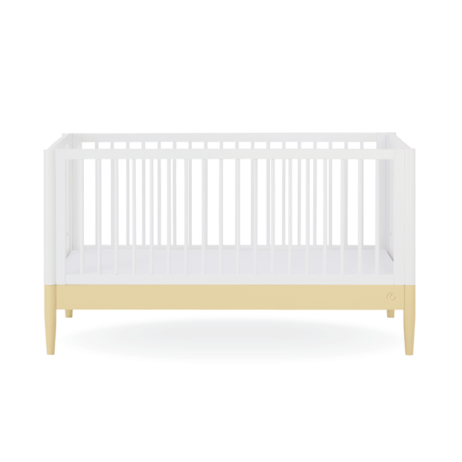 White Gaia Baby Eos cot bed with Primrose Yellow accents, sturdy frame and safety rails for a nursery or child's bedroom.