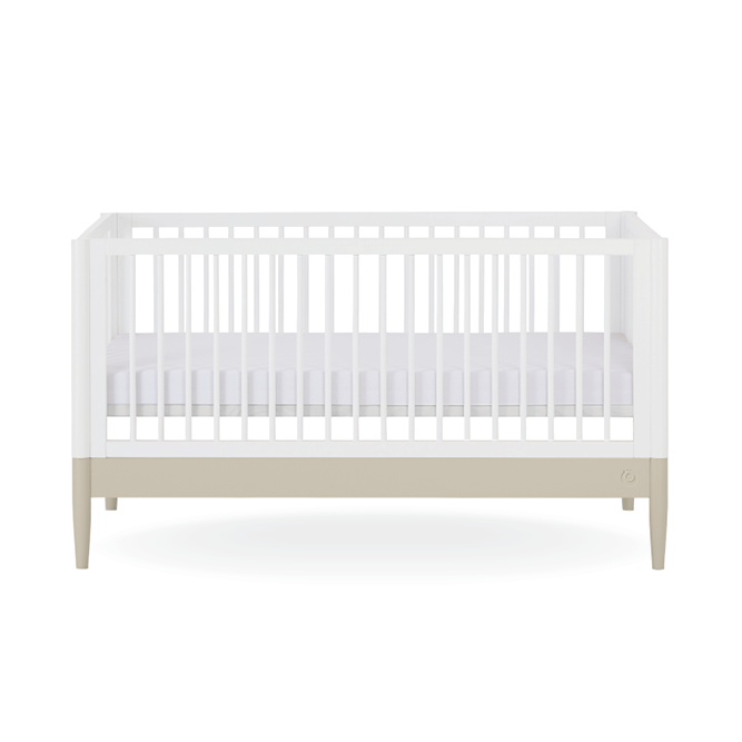 White Gaia Baby Eos Cot Bed with sleek frame and desert sage accents, designed for safe and comfortable baby sleep.