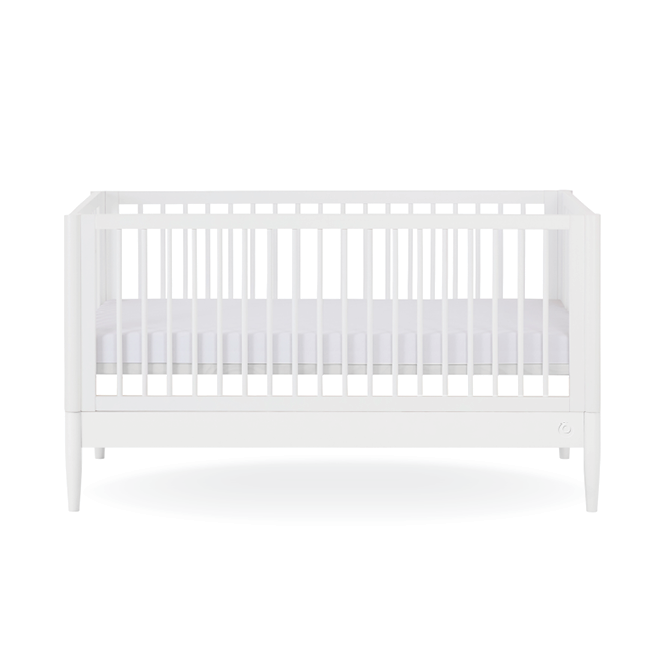 White Gaia Baby Eos cot bed with a sturdy frame, designed for nursery comfort and safety.