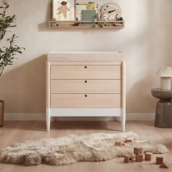 Natural white Gaia Baby Eos Dresser with multiple drawers, made of wood, ideal for nursery storage and organization.
