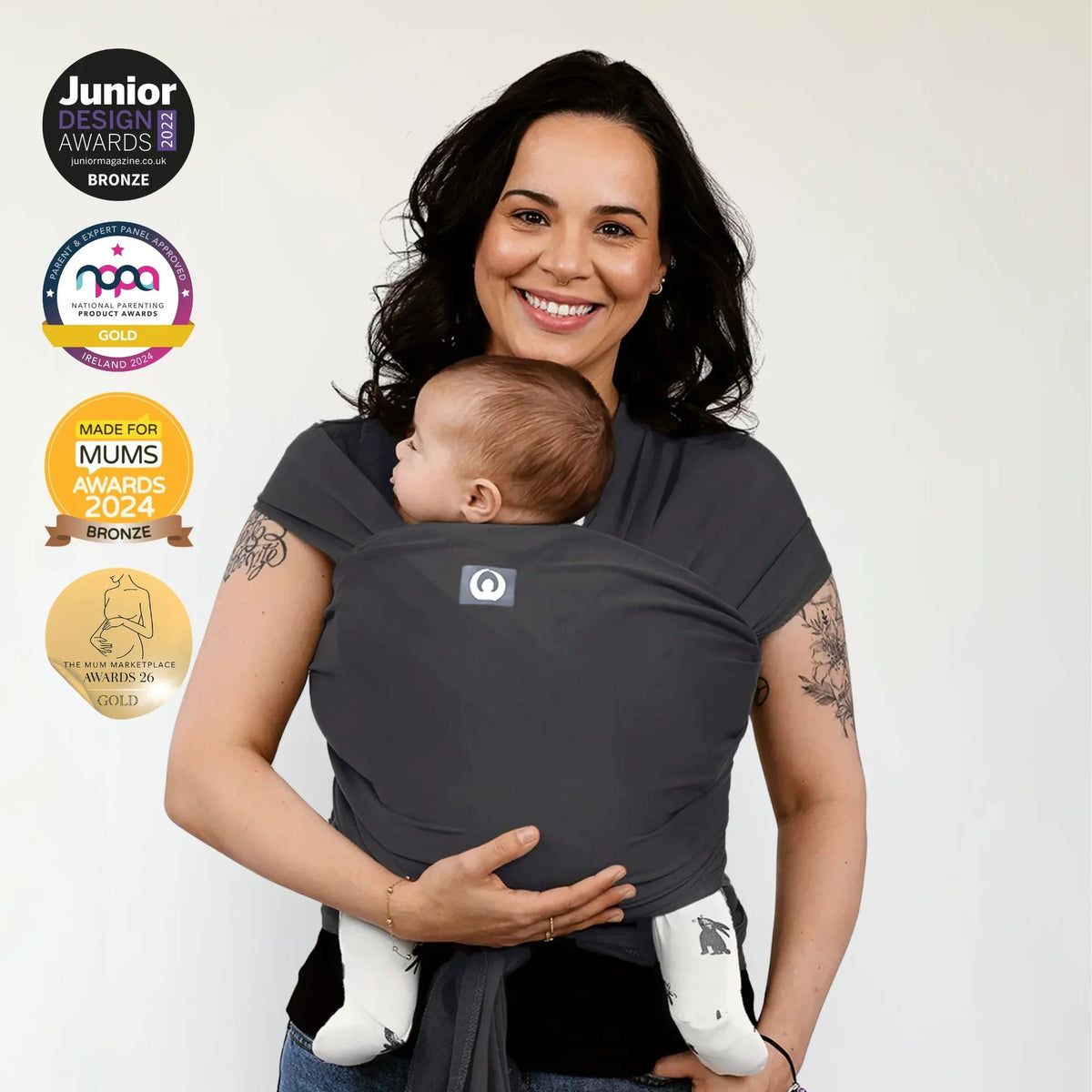 Gaia Baby stretchy baby wrap in graphite, made from soft, flexible fabric, designed for comfortable carrying and bonding.