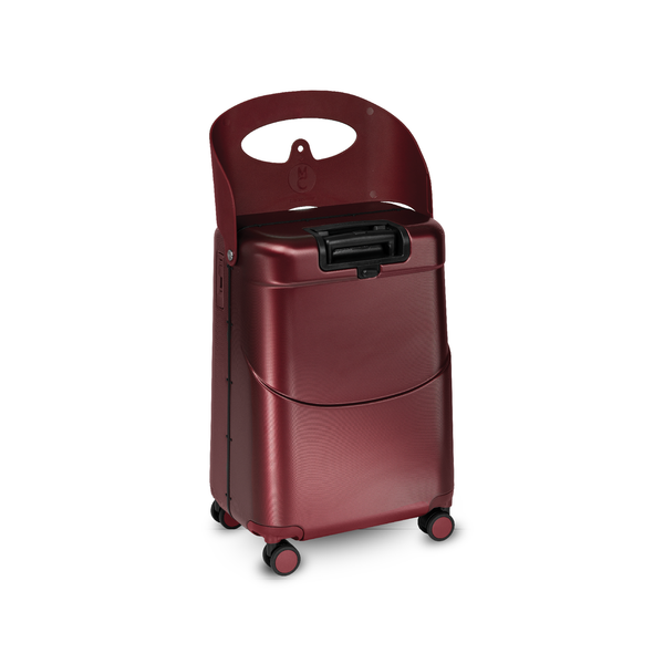 Burgundy red MiaMily Check In Plus suitcase with hard shell and four spinner wheels, standing upright on a white background.